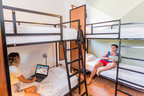 Cama en Dormitorio 4-Camas at Hostel | 